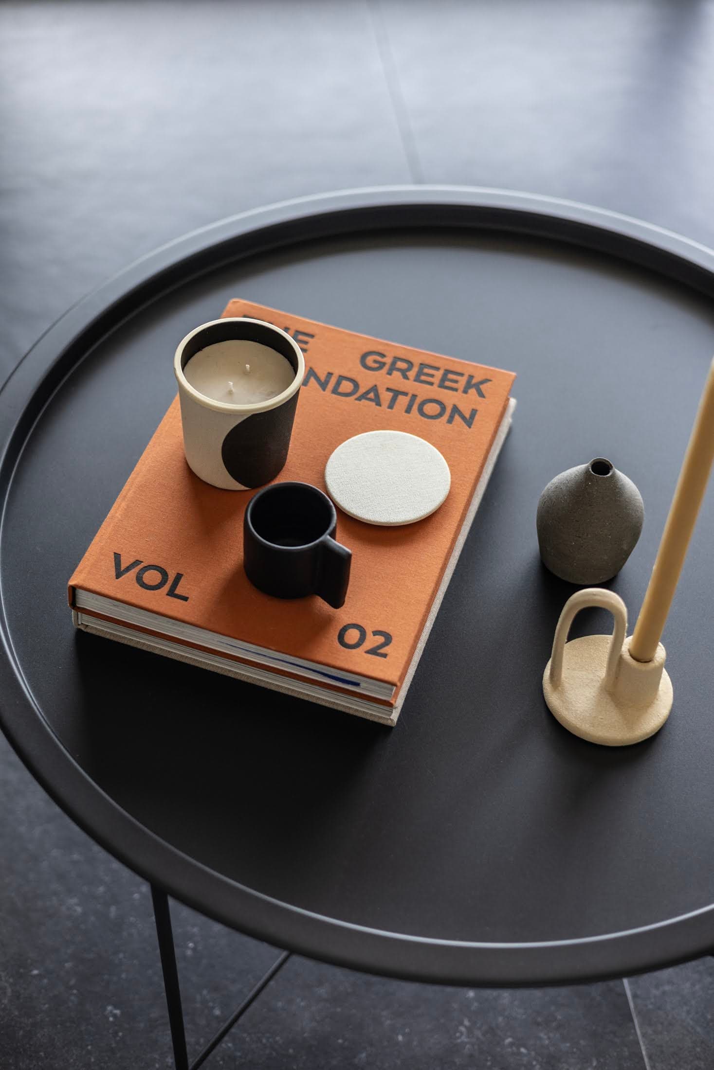 Styled coffee table with modern ceramic decor